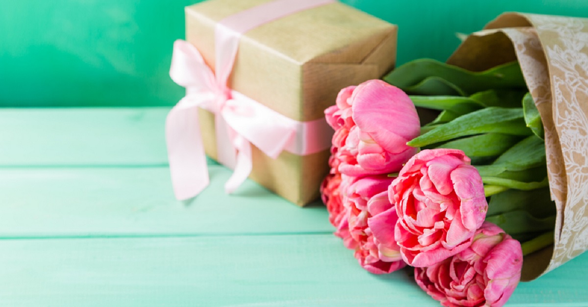 Pink flowers and a gift.